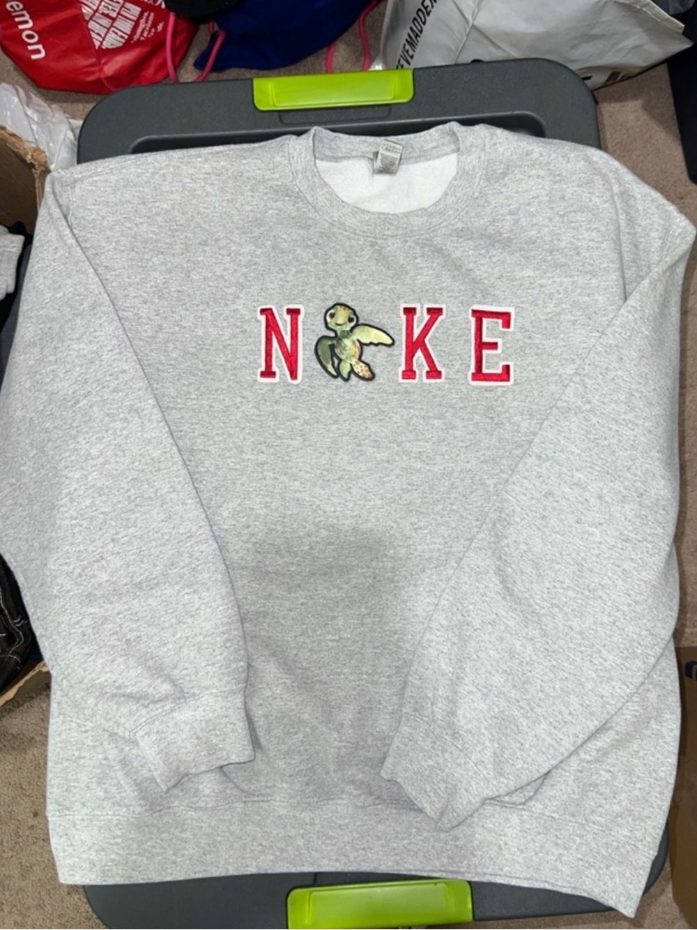 Gray Crewneck Nike Squirt Sweatshirt with Red Lettering and Finding Nemo Patch